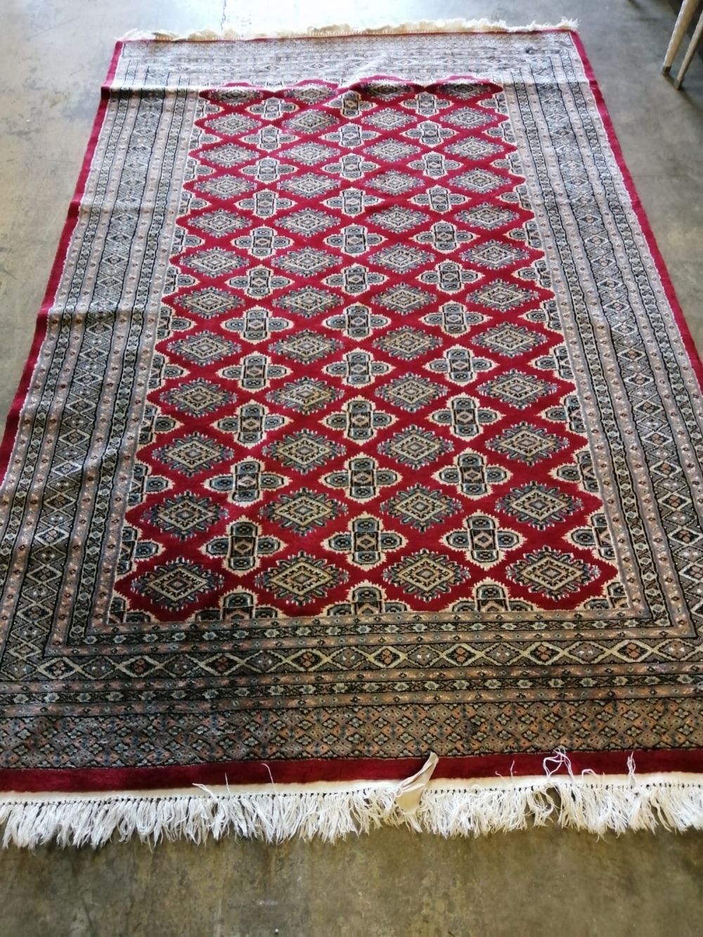 A Pakistan Persian pattern rug, red ground, 237 x 153cm